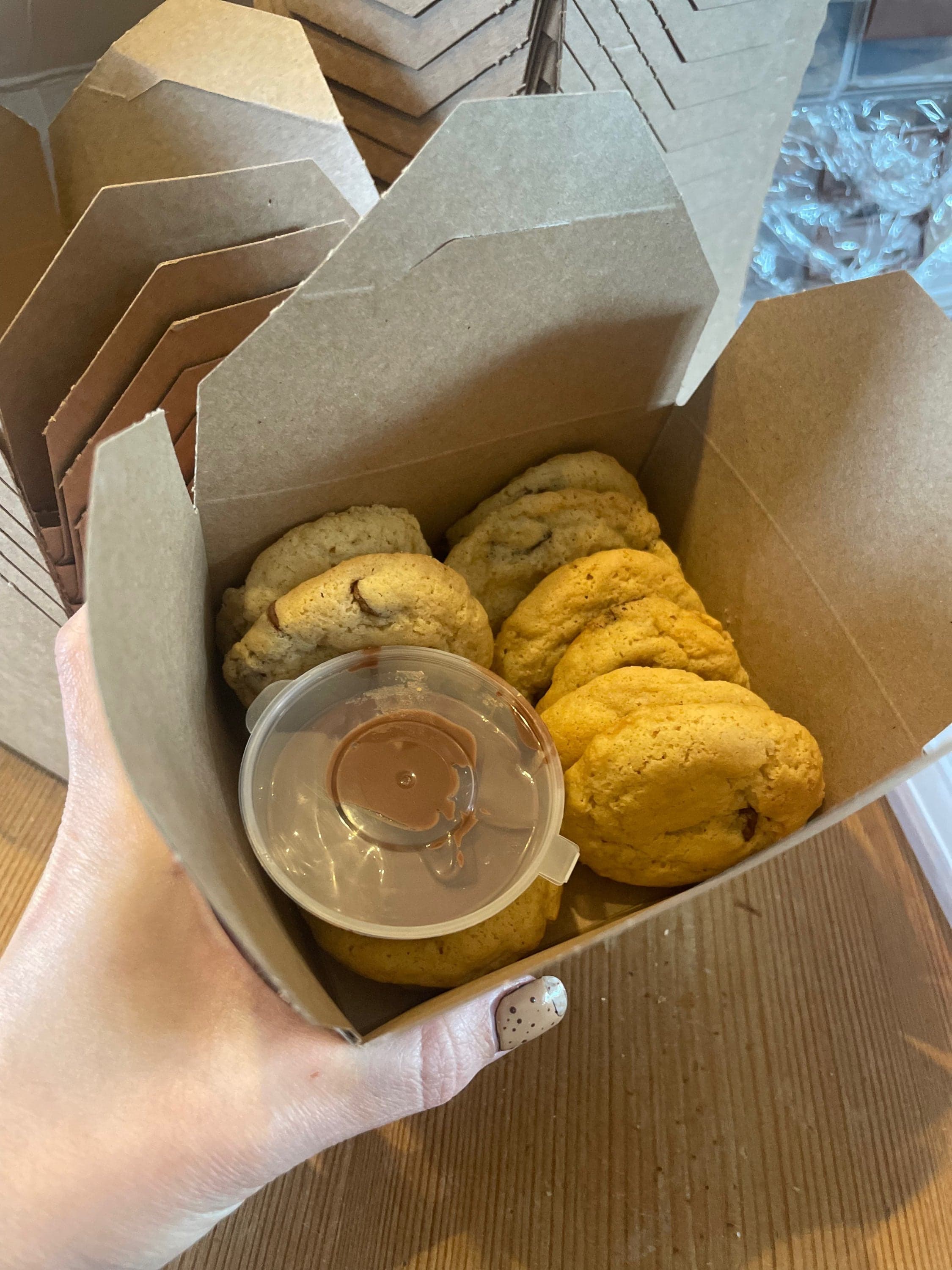 A sealed kraft box of cookies ready to be dispatched